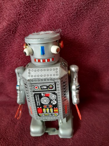 Vintage small clockwork tin