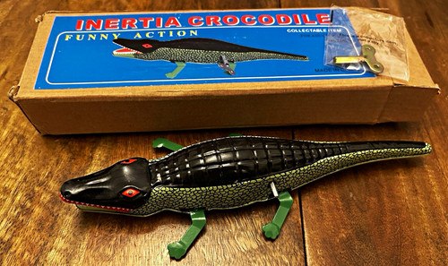 Inertia crocodile tin toy - inertia,