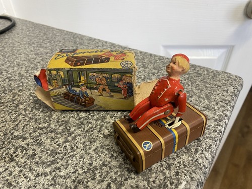 Vintage tinplate clockwork toy