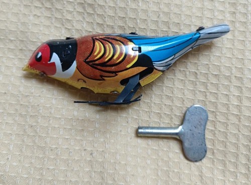 Tinplate clockwork pecking - clockwork,