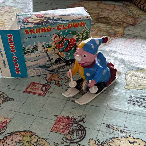 Vintage skiing clown clockwork - skiing,